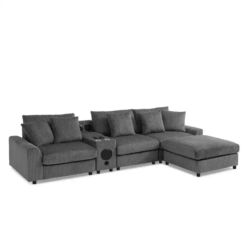 Divano componibile a L in velluto a coste da 114'' con altoparlanti Bluetooth, caricabatterie USB, portabicchieri e pouf - ModernLuxe