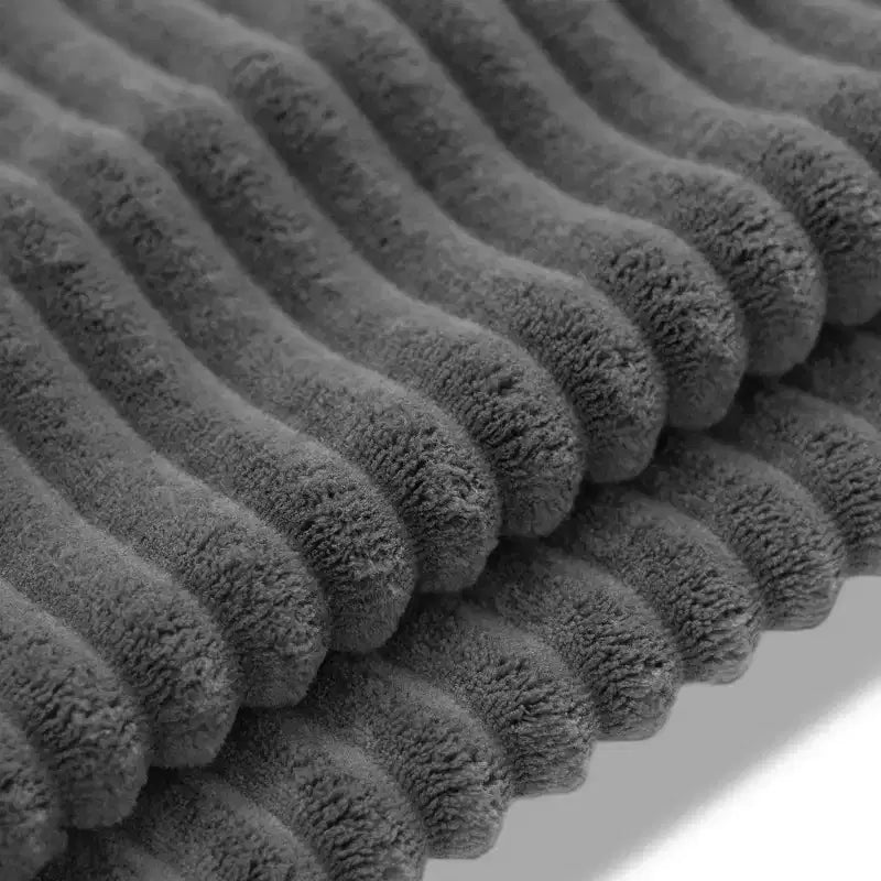 Divano componibile a L in velluto a coste da 114'' con altoparlanti Bluetooth, caricabatterie USB, portabicchieri e pouf - ModernLuxe