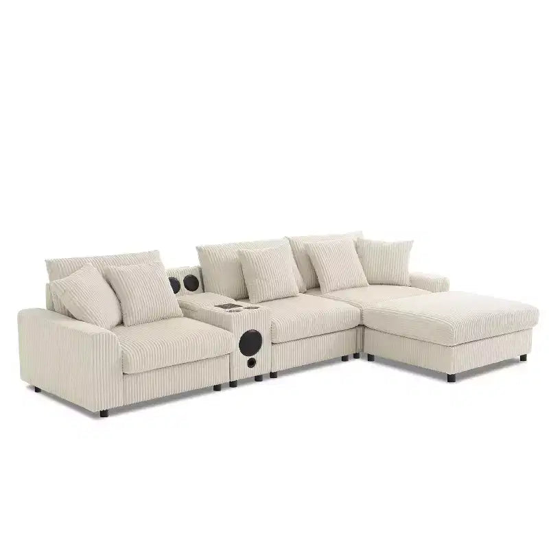Divano componibile a L in velluto a coste da 114'' con altoparlanti Bluetooth, caricabatterie USB, portabicchieri e pouf - ModernLuxe