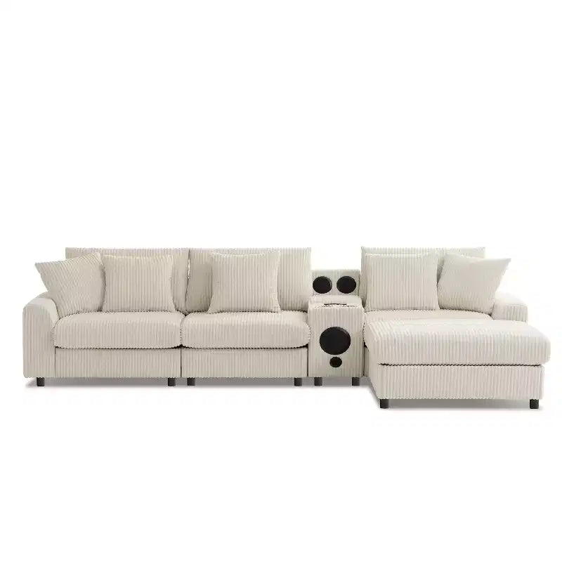 Divano componibile a L in velluto a coste da 114'' con altoparlanti Bluetooth, caricabatterie USB, portabicchieri e pouf - ModernLuxe