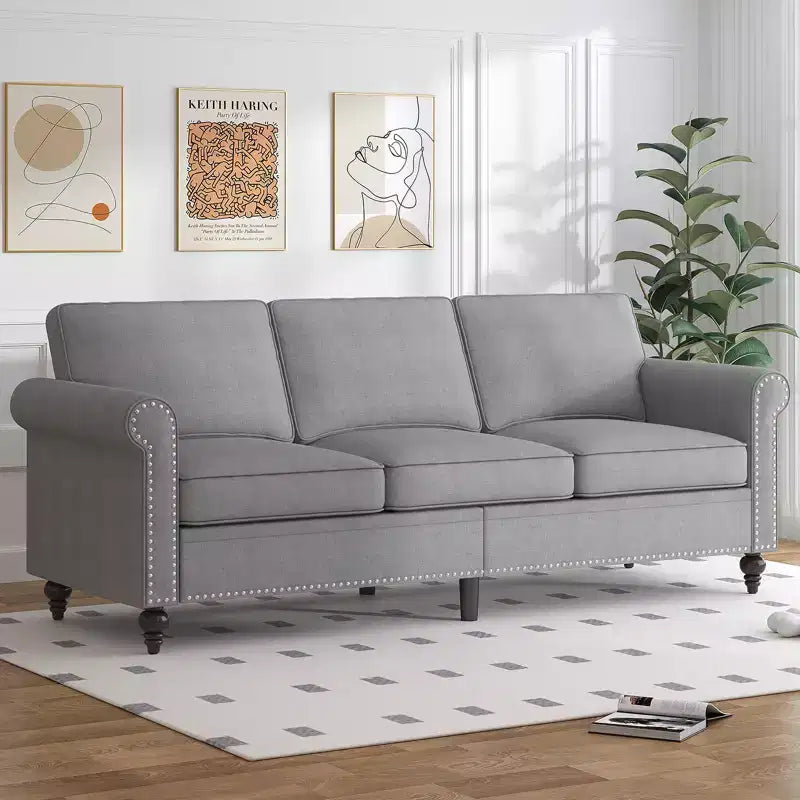 Divano moderno a 3 posti Mjkone in tessuto di lino con design a rivetti