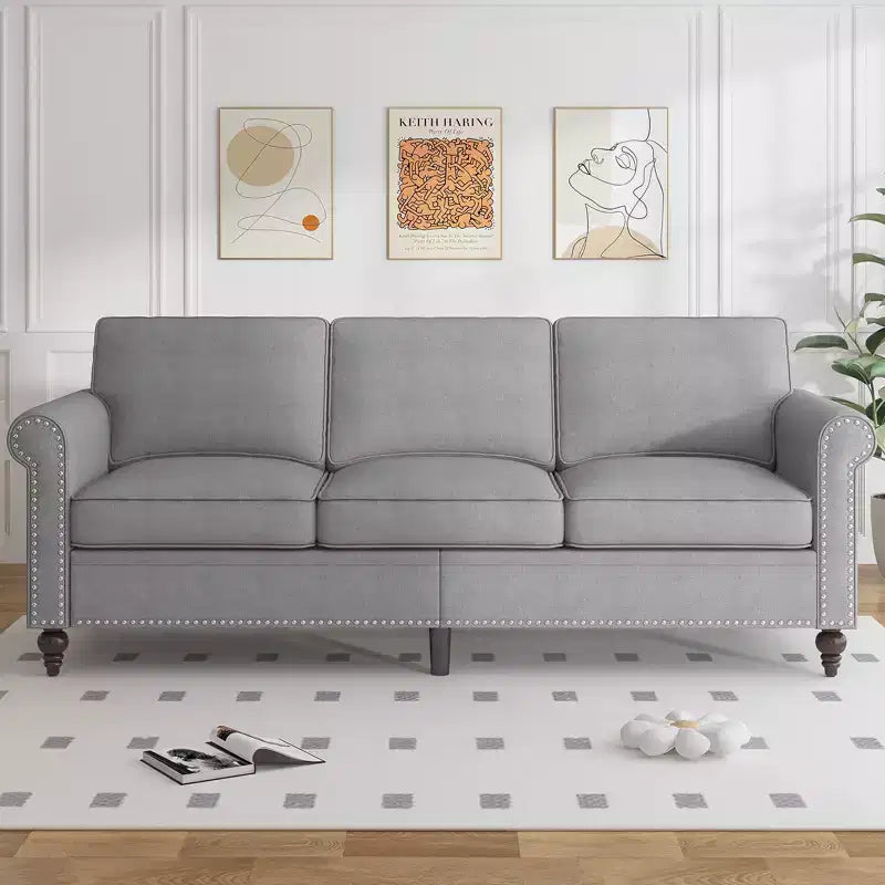 Divano moderno a 3 posti Mjkone in tessuto di lino con design a rivetti