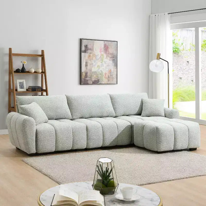 Divano componibile a L Merax con pouf mobile