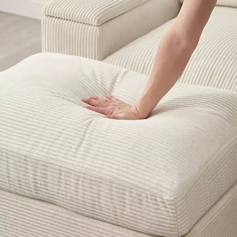 Divano sezionale Dovelina con seduta profonda verde e pouf, 4 posti