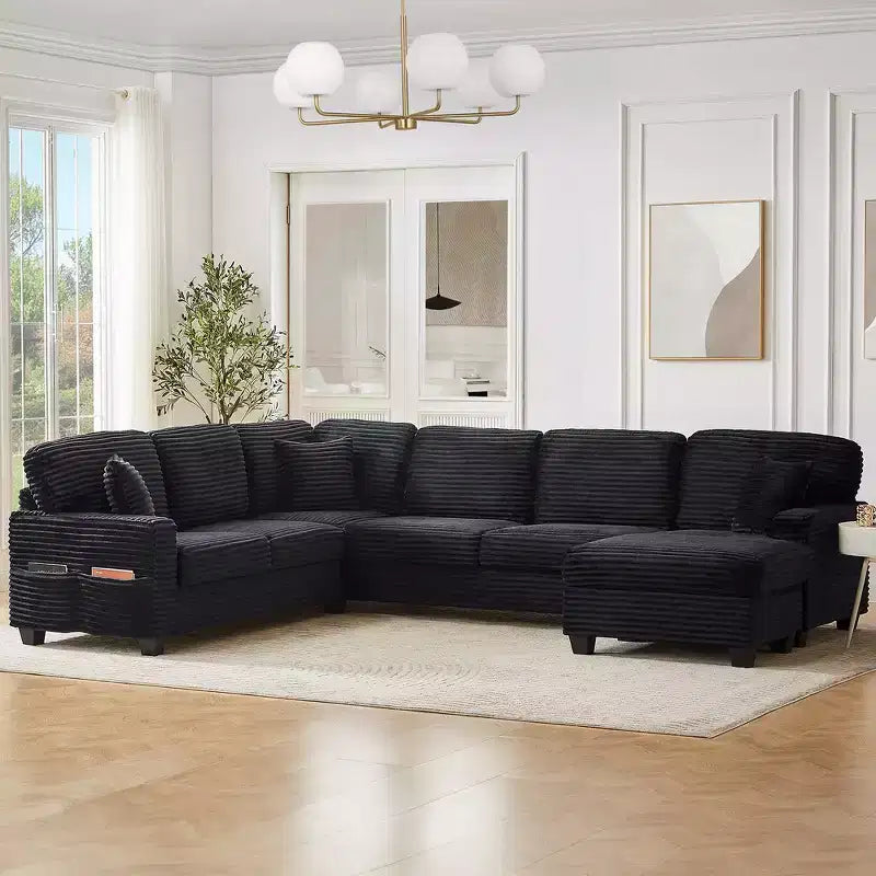 Divano sezionale Whisen in velluto a coste con pouf mobile e tasche laterali portaoggetti