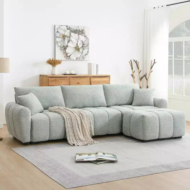 Divano sezionale modulare a L da 110 pollici con seduta extra-large, cuscino con cuciture a vista, pouf, rivestimento in tessuto bouclé, 4 posti