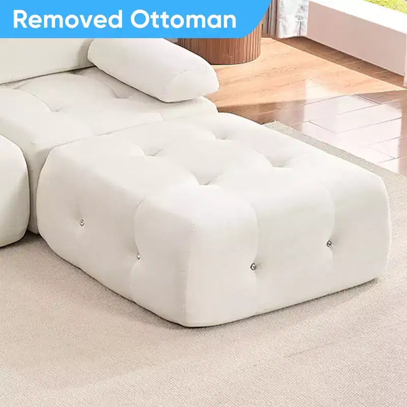Divano sezionale in velluto a forma di L Mjkone, divano componibile a 4 posti con pouf, divani trasformabili con bordo borchiato