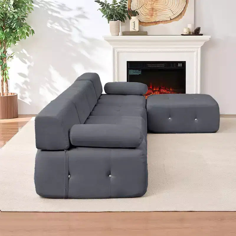 Divano sezionale in velluto a forma di L Mjkone, divano componibile a 4 posti con pouf, divani trasformabili con bordo borchiato