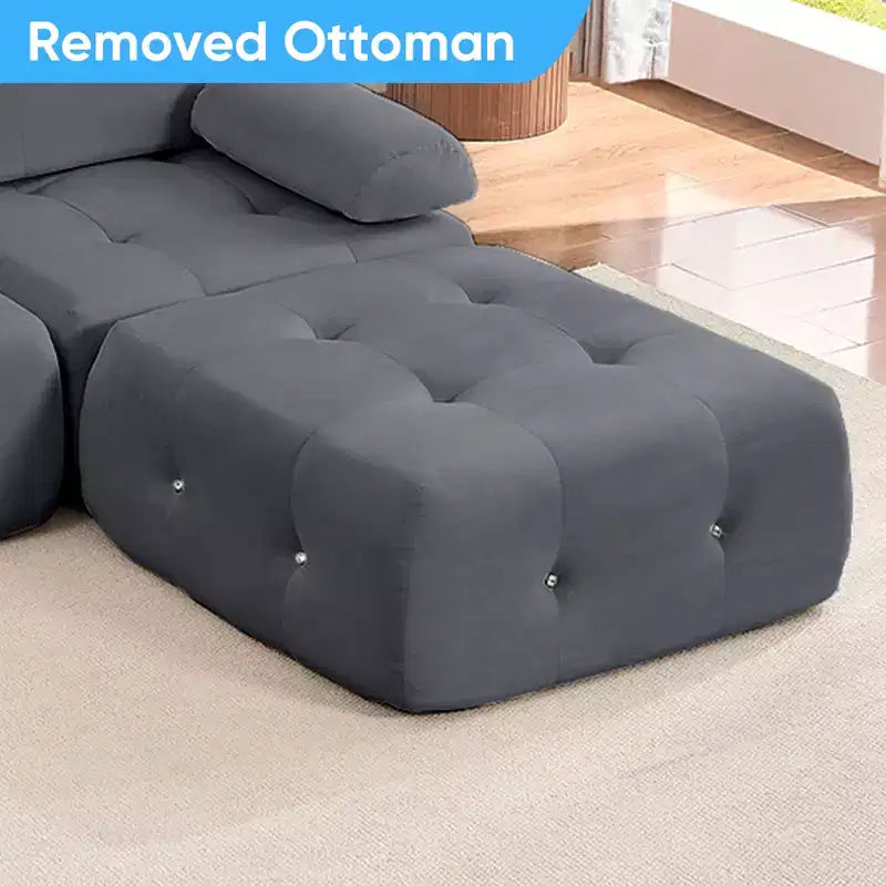 Divano sezionale in velluto a forma di L Mjkone, divano componibile a 4 posti con pouf, divani trasformabili con bordo borchiato