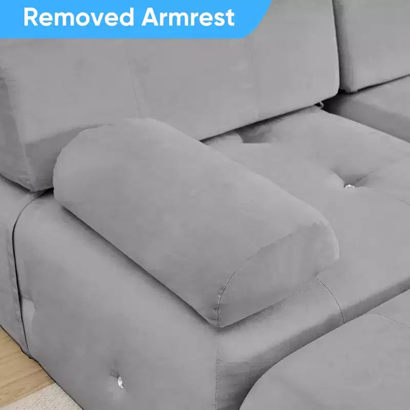 Divano sezionale in velluto a forma di L Mjkone, divano componibile a 4 posti con pouf, divani trasformabili con bordo borchiato