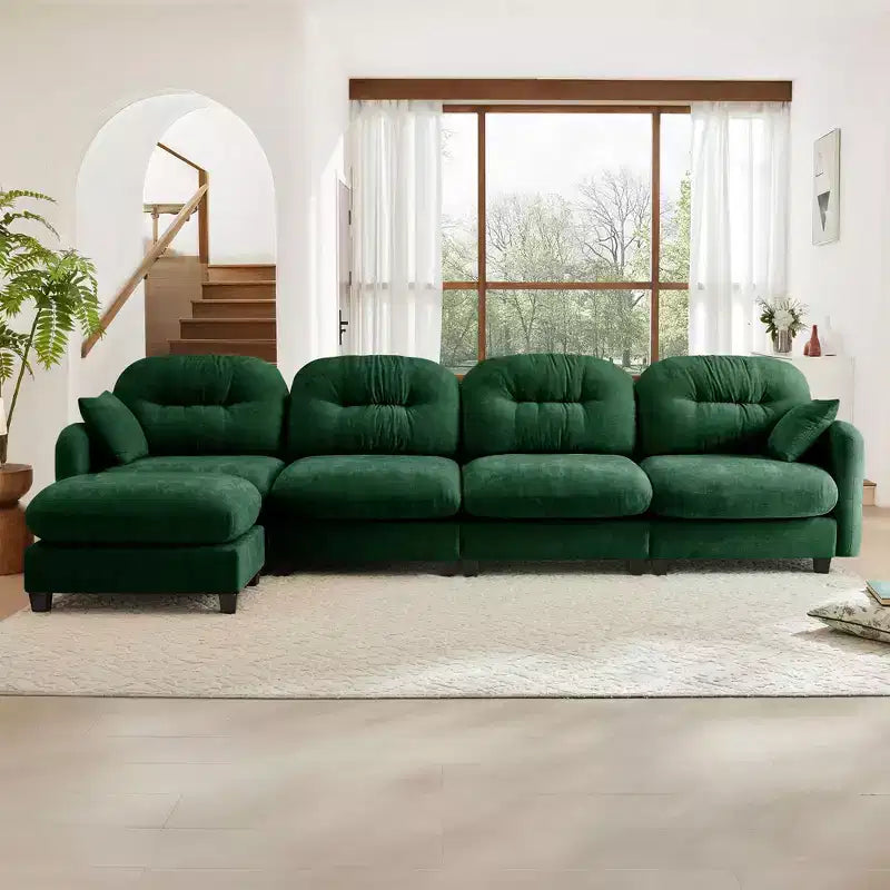 Divano componibile a L in ciniglia beige con pouf e base in legno di alta qualità per salotti