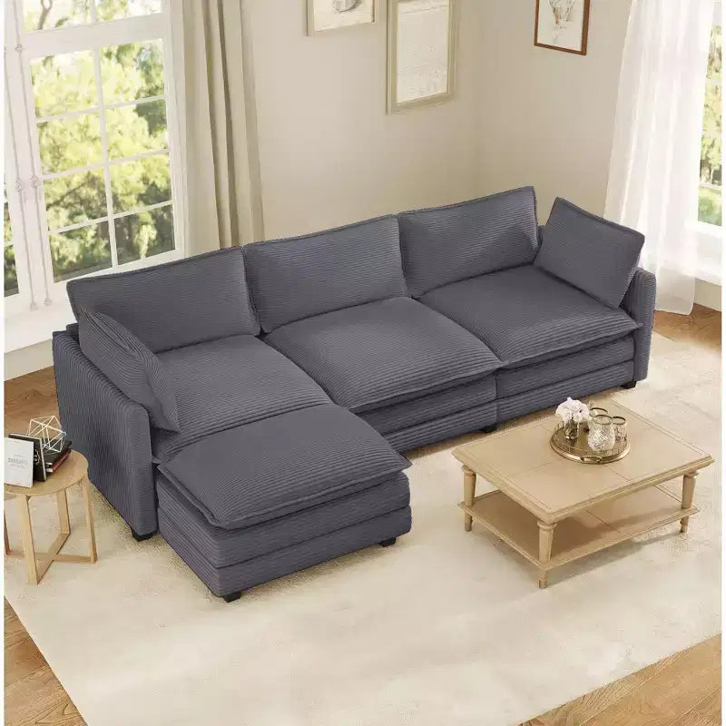 Divano componibile a L Hyleory Cozy Corduroy con poggiapiedi mobile - Tocco Morbido, Design Salvaspazio