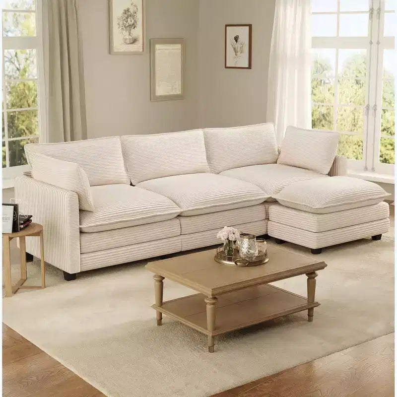 Divano componibile a L Hyleory Cozy Corduroy con poggiapiedi mobile - Tocco Morbido, Design Salvaspazio
