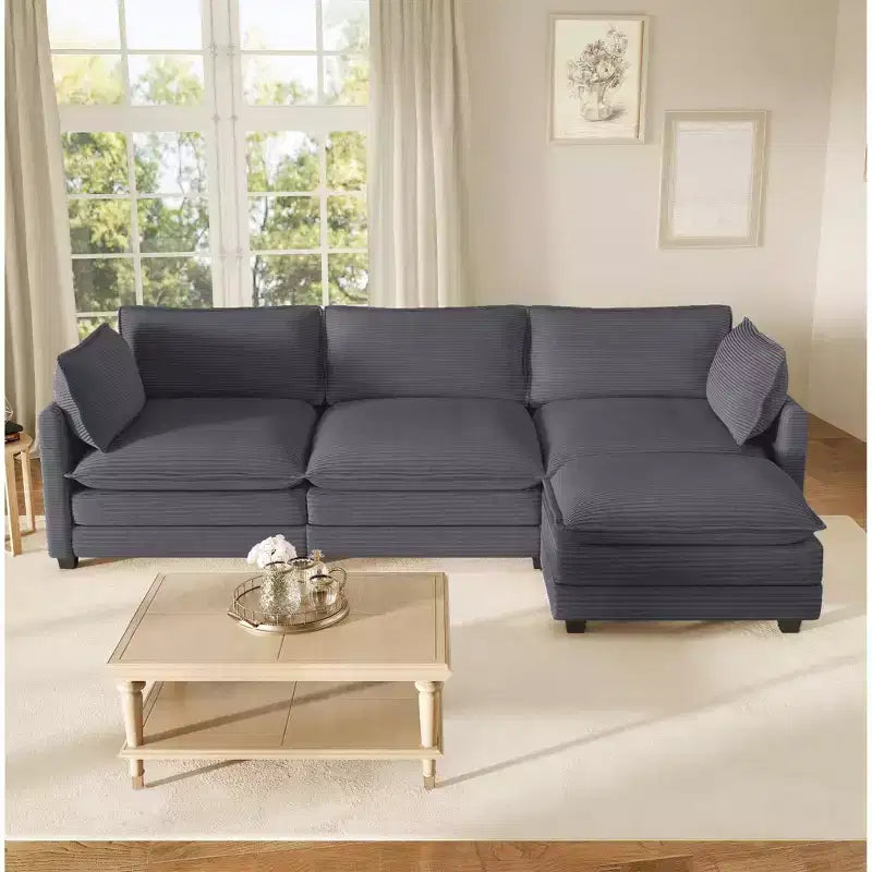 Divano componibile a L Hyleory Cozy Corduroy con poggiapiedi mobile - Tocco Morbido, Design Salvaspazio