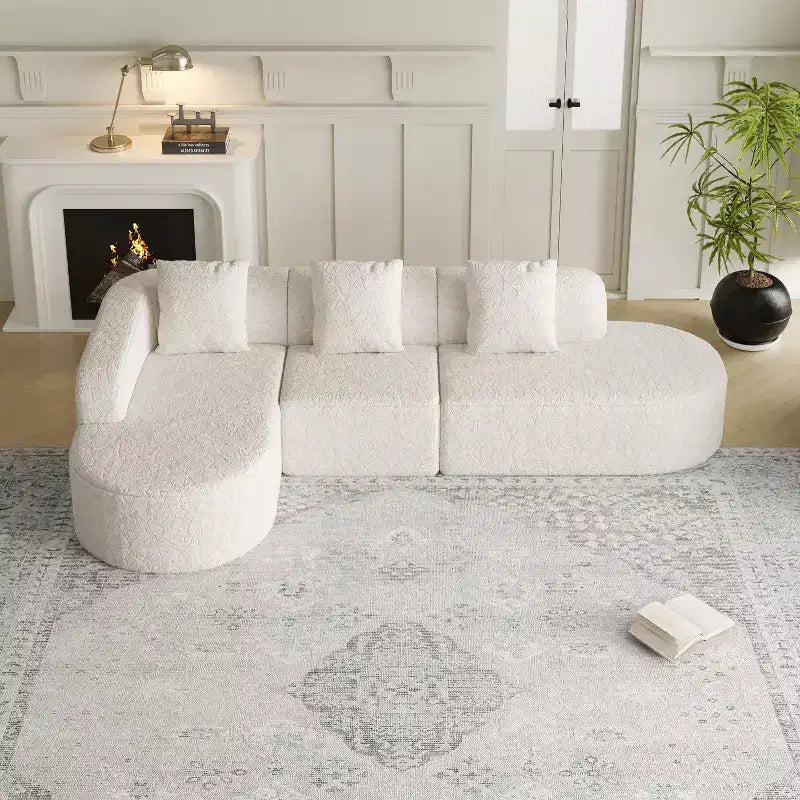 Divano curvo modulare a L in tessuto Lenhart di GDFStudio con chaise longue extra larga