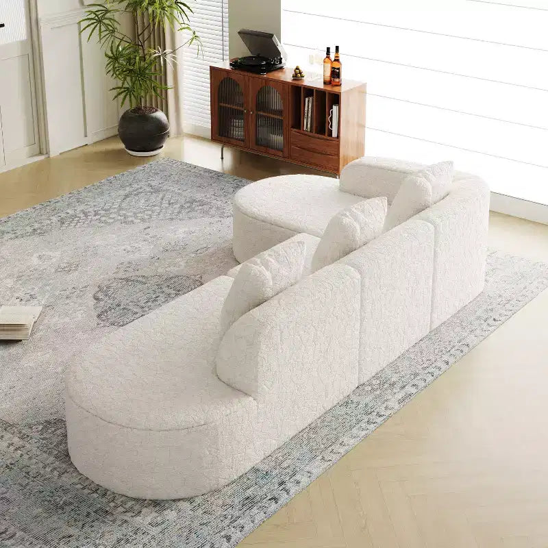 Divano curvo modulare a L in tessuto Lenhart di GDFStudio con chaise longue extra larga