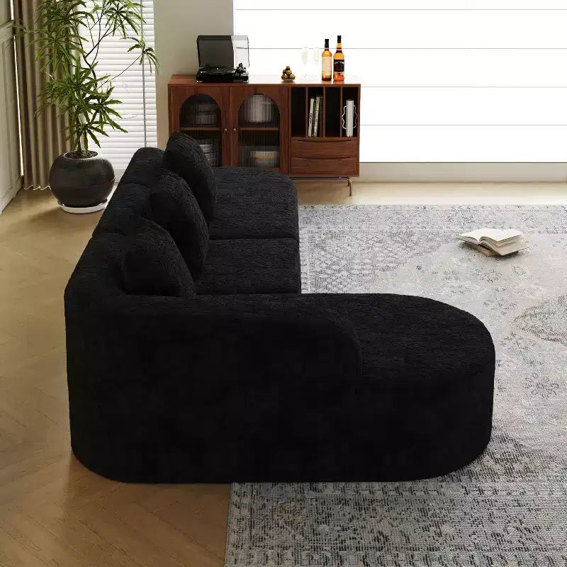 Divano curvo modulare a L in tessuto Lenhart di GDFStudio con chaise longue extra larga