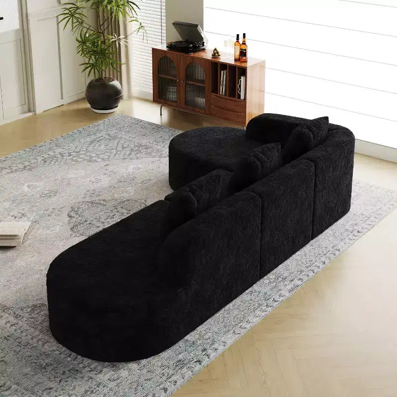 Divano curvo modulare a L in tessuto Lenhart di GDFStudio con chaise longue extra larga