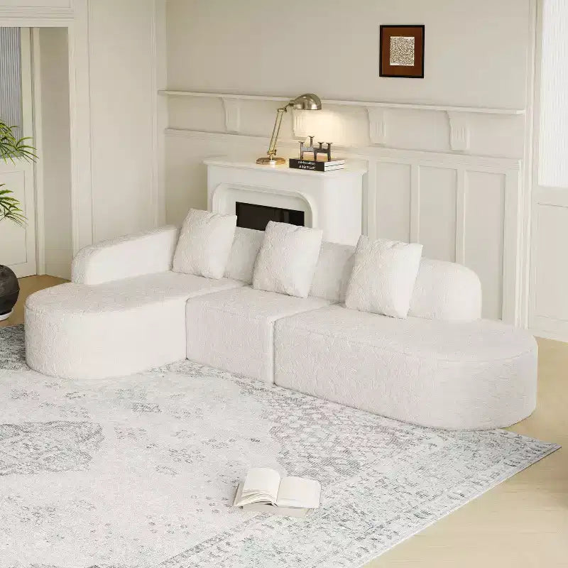 Divano curvo modulare a L in tessuto Lenhart di GDFStudio con chaise longue extra larga