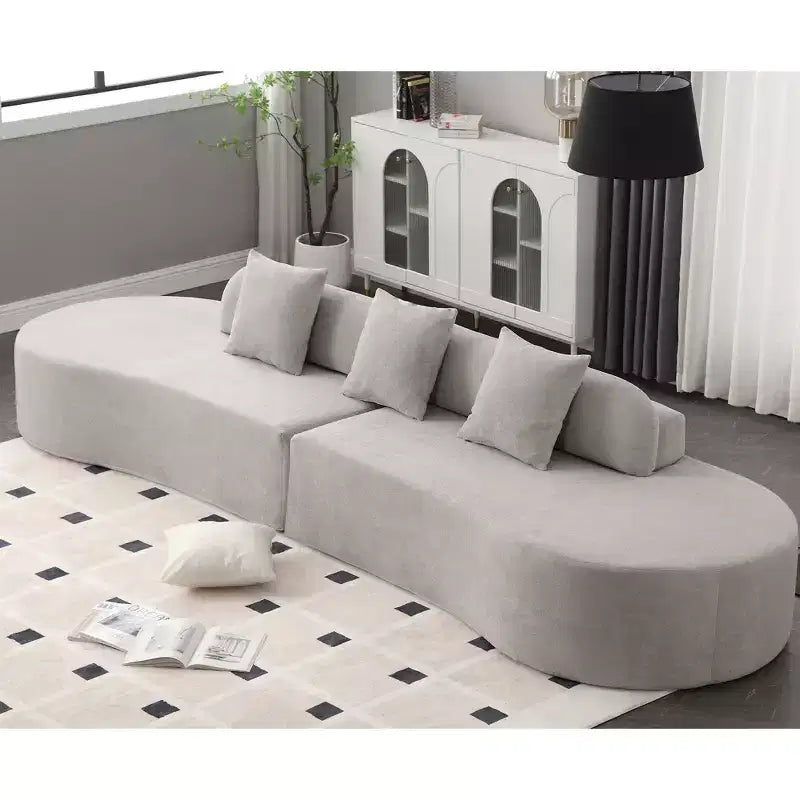 GDFStudio Xevor 130.5 Divano Moderno Curvo a 4 Posti Rivestito in Spugna con 3 Cuscini